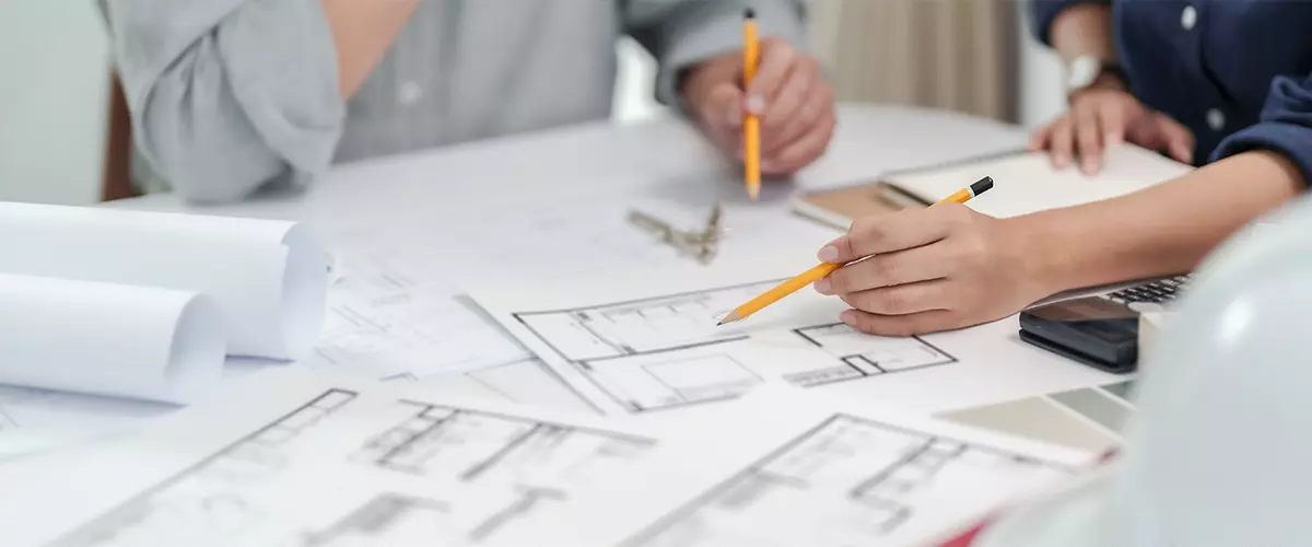 Architect working on the desk, construction project ideas architecture engineer