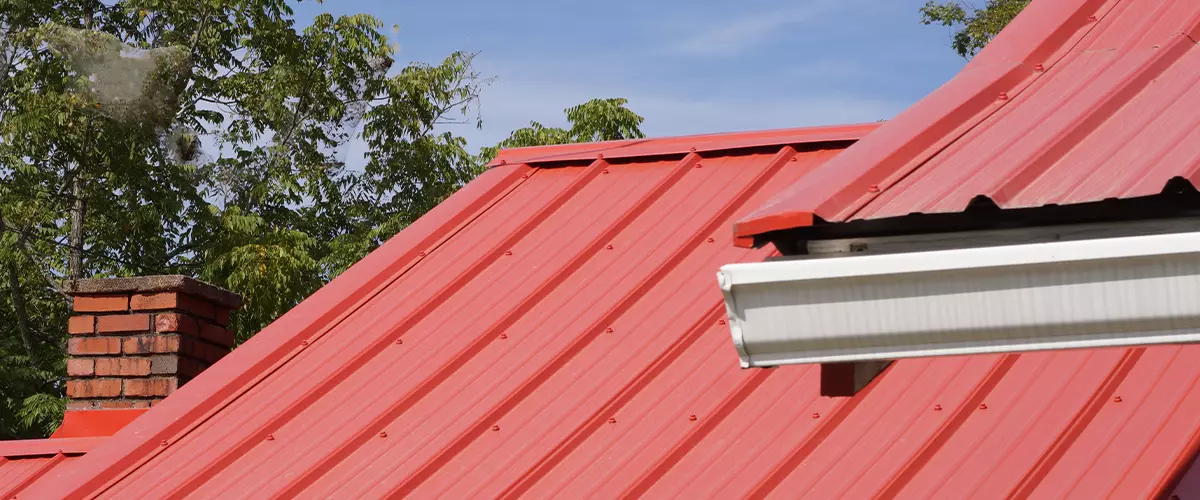 Red metal house roof