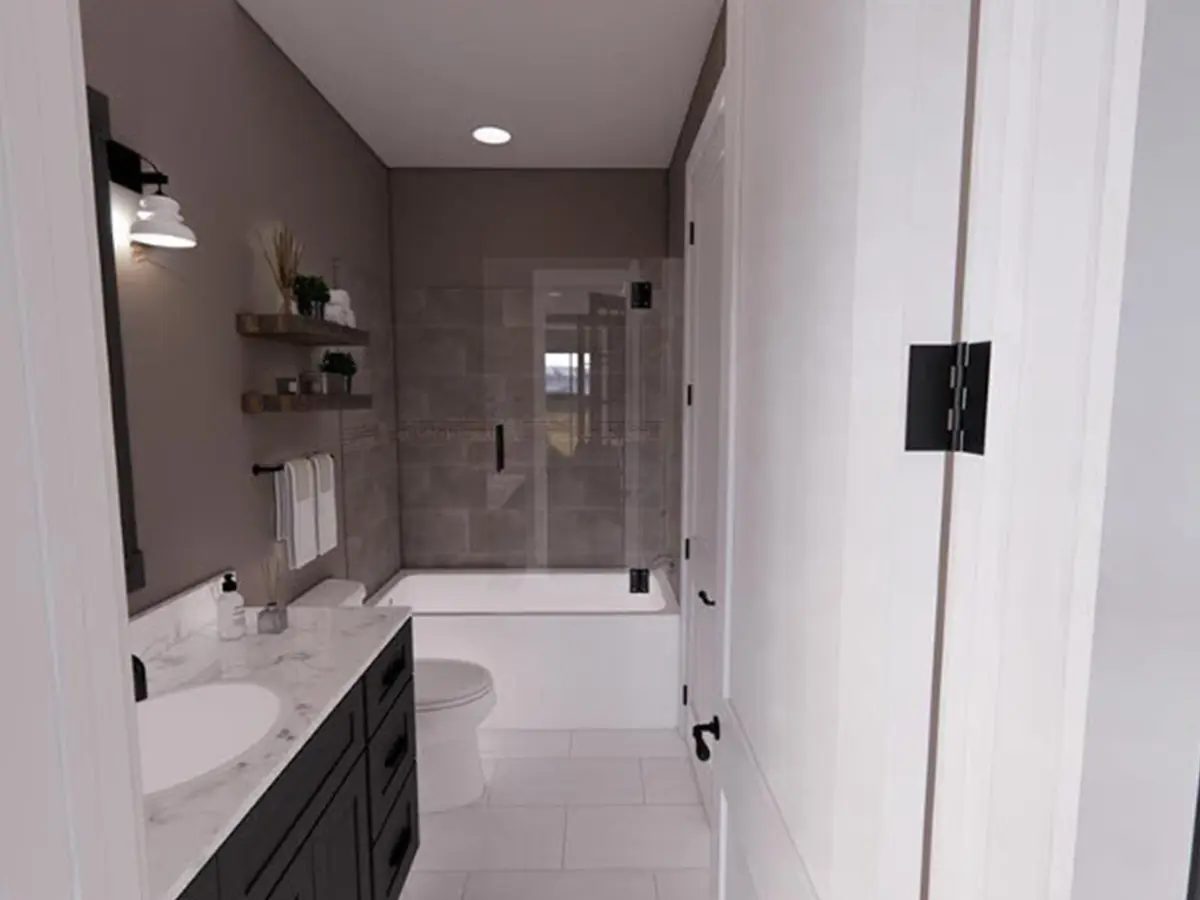 small bathroom, with gray walls, a white tile floor, black cabinets, and a white marble countertop sink.