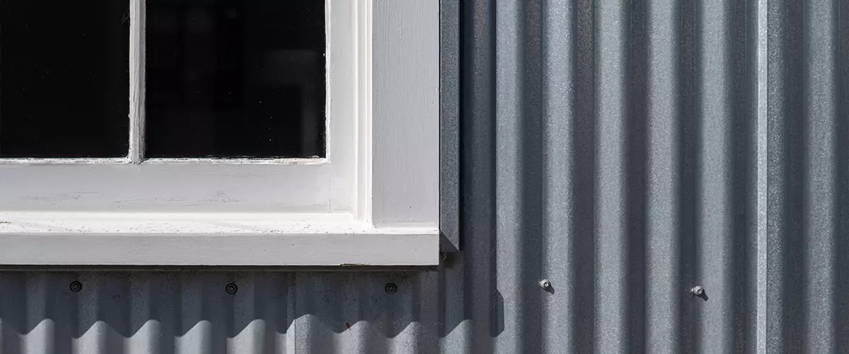window with metal siding